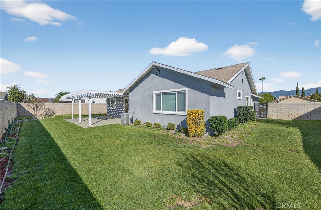 831 West Cerritos Street Rialto, CA 92376 - Photo 41 of 47 a view of a house with backyard and garden