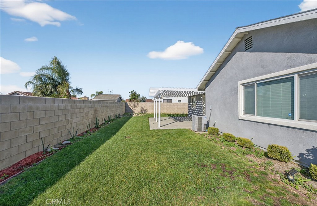 831 West Cerritos Street Rialto, CA 92376 - Photo 43 of 47 a view of a backyard with plants and a garden
