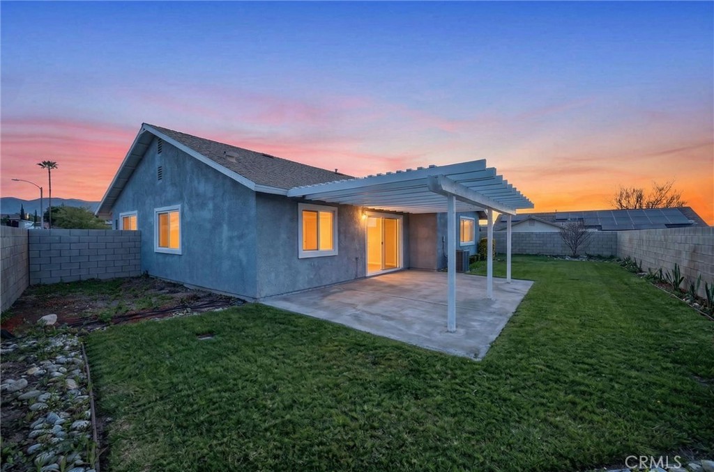 831 West Cerritos Street Rialto, CA 92376 - Photo 44 of 47 a view of a yard in front of a house with a yard