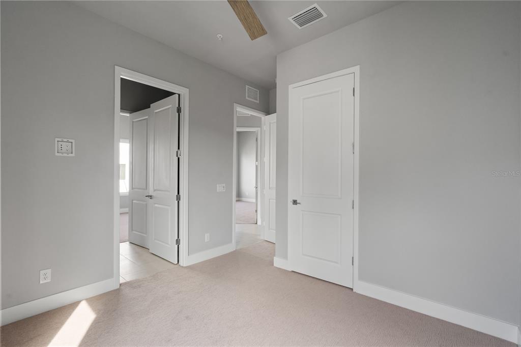 7770 Sandy Ridge Drive, Unit 239 Reunion, FL 34747 - Photo 11 of 49 a view of an empty room