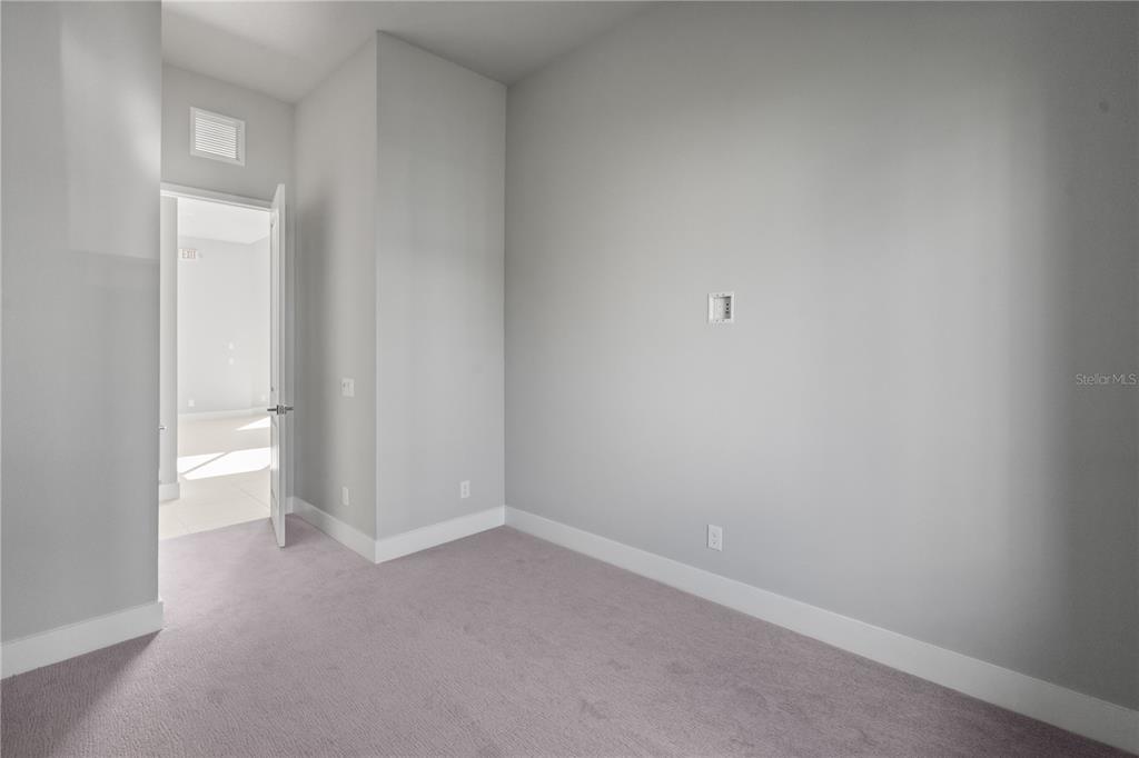7770 Sandy Ridge Drive, Unit 239 Reunion, FL 34747 - Photo 13 of 49 a view of an empty room