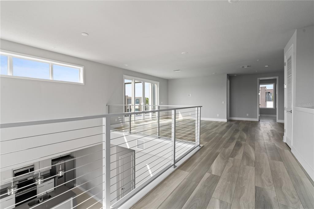 7770 Sandy Ridge Drive, Unit 239 Reunion, FL 34747 - Photo 17 of 49 a view of entryway with wooden floor