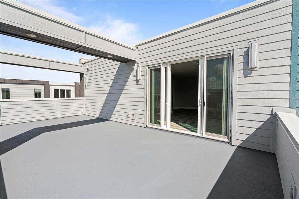 7770 Sandy Ridge Drive, Unit 239 Reunion, FL 34747 - Photo 26 of 49 a view of a house with a balcony