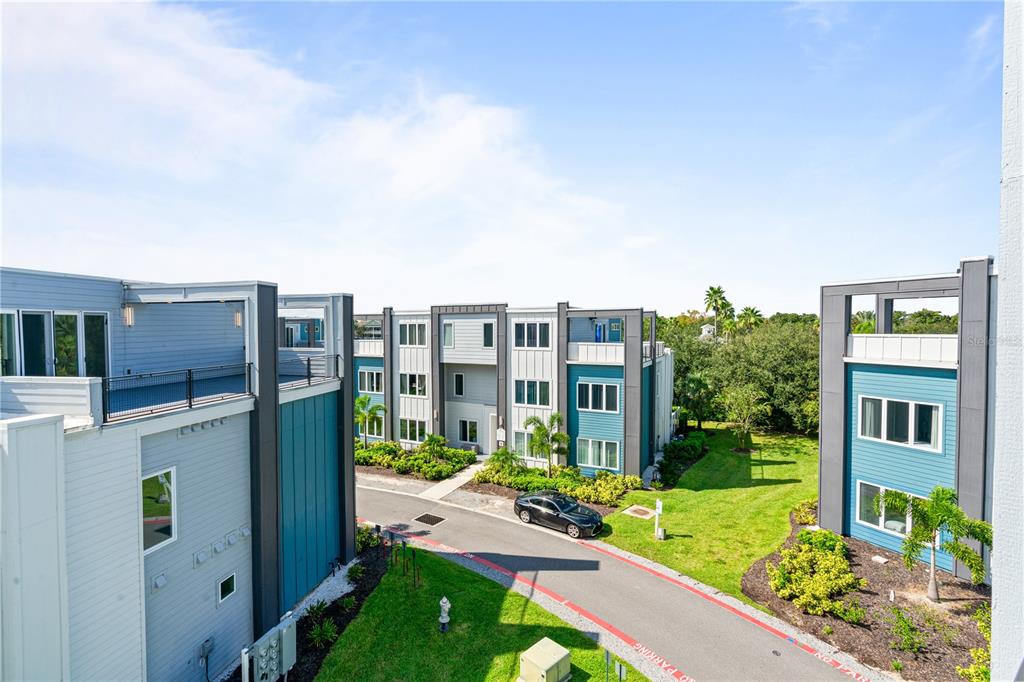 7770 Sandy Ridge Drive, Unit 239 Reunion, FL 34747 - Photo 27 of 49 a view of a house with backyard from a kitchen