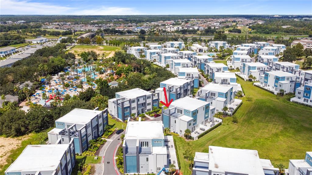 7770 Sandy Ridge Drive, Unit 239 Reunion, FL 34747 - Photo 31 of 49 an aerial view of residential building with outdoor space