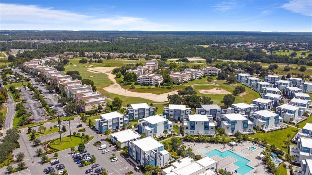 7770 Sandy Ridge Drive, Unit 239 Reunion, FL 34747 - Photo 34 of 49 an aerial view of residential houses with outdoor space