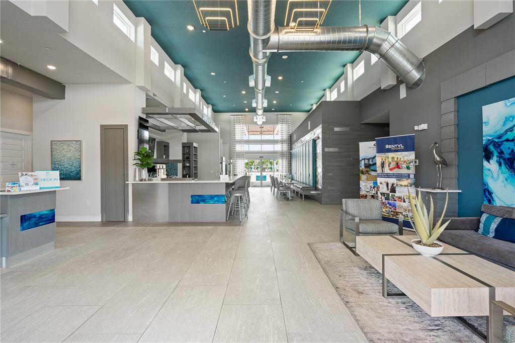 7770 Sandy Ridge Drive, Unit 239 Reunion, FL 34747 - Photo 38 of 49 a living room with furniture and kitchen view