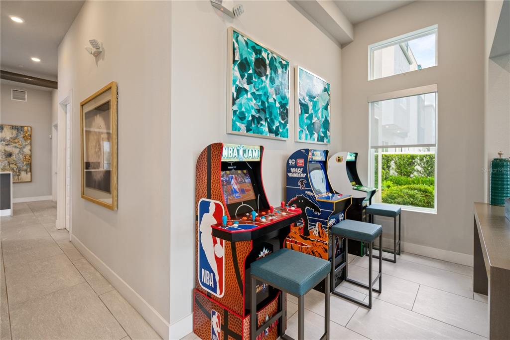 7770 Sandy Ridge Drive, Unit 239 Reunion, FL 34747 - Photo 44 of 49 a view of a workspace with furniture and a window