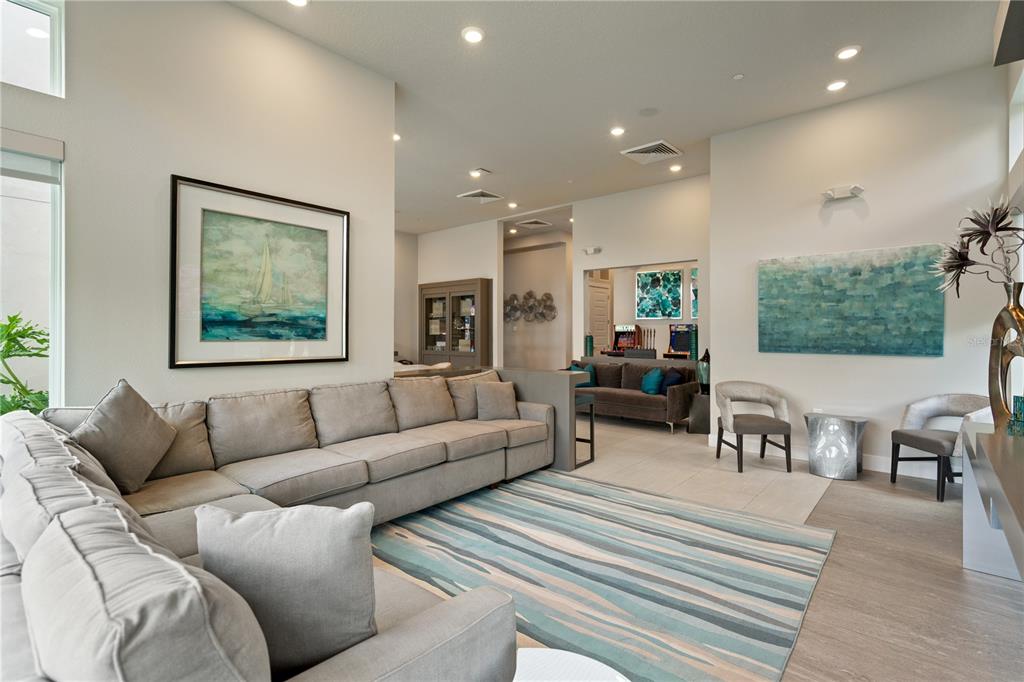 7770 Sandy Ridge Drive, Unit 239 Reunion, FL 34747 - Photo 46 of 49 a living room with furniture and a large window