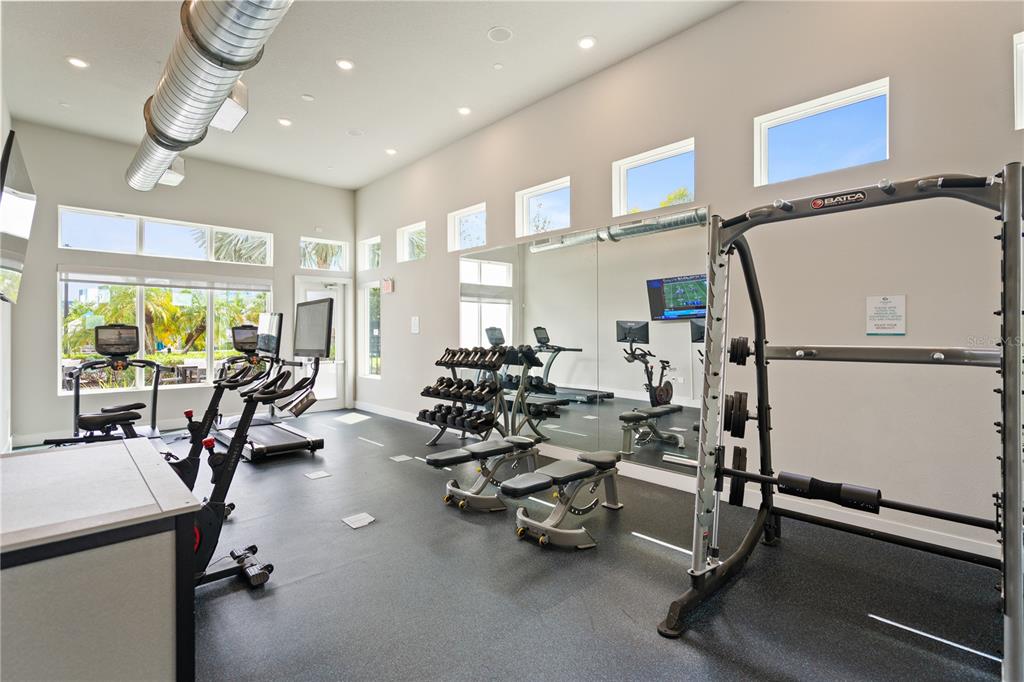7770 Sandy Ridge Drive, Unit 239 Reunion, FL 34747 - Photo 47 of 49 a view of a room with gym equipment