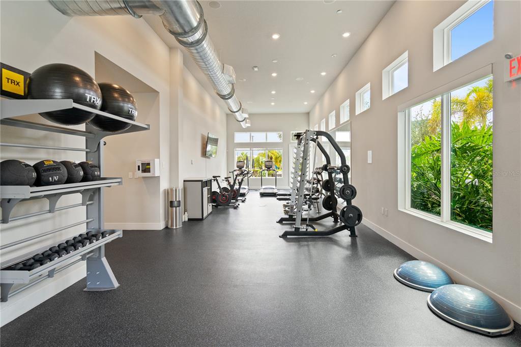 7770 Sandy Ridge Drive, Unit 239 Reunion, FL 34747 - Photo 49 of 49 a view of a room with gym equipment