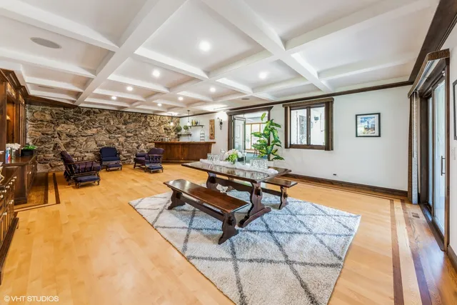 a living room with lots of furniture and a rug