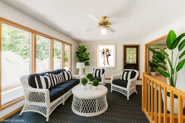 a dining room with furniture and window