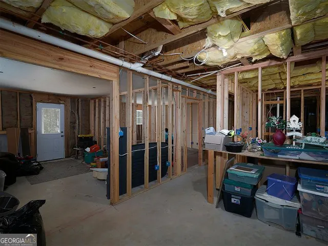 a view of a storage room with furniture