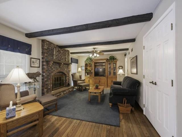 2N555 Beith Road Elburn, IL 60119 - Photo 13 of 22 a living room with furniture and a fireplace