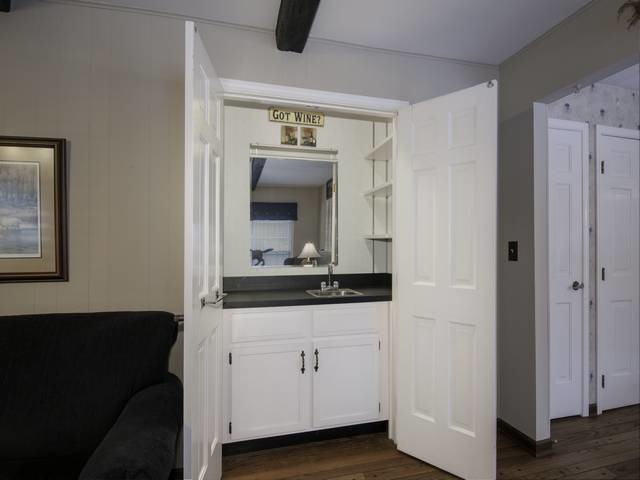2N555 Beith Road Elburn, IL 60119 - Photo 14 of 22 a en suite bathroom with a granite countertop sink and a mirror