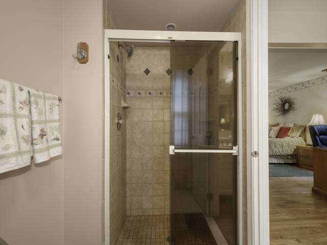 2N555 Beith Road Elburn, IL 60119 - Photo 20 of 22 a bathroom with a glass shower door