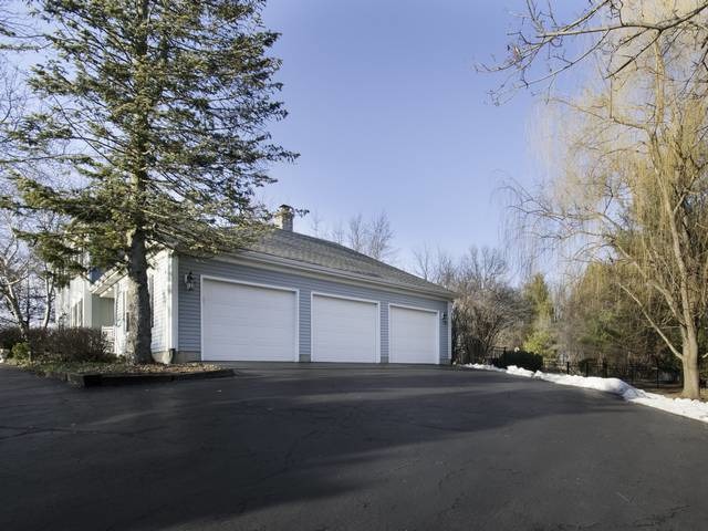 2N555 Beith Road Elburn, IL 60119 - Photo 4 of 22 a front view of a house with a yard and garage