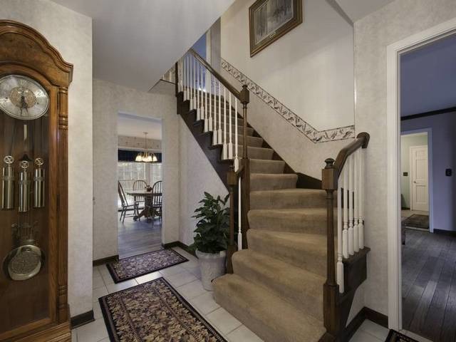 2N555 Beith Road Elburn, IL 60119 - Photo 5 of 22 a view of entryway and hall with wooden floor