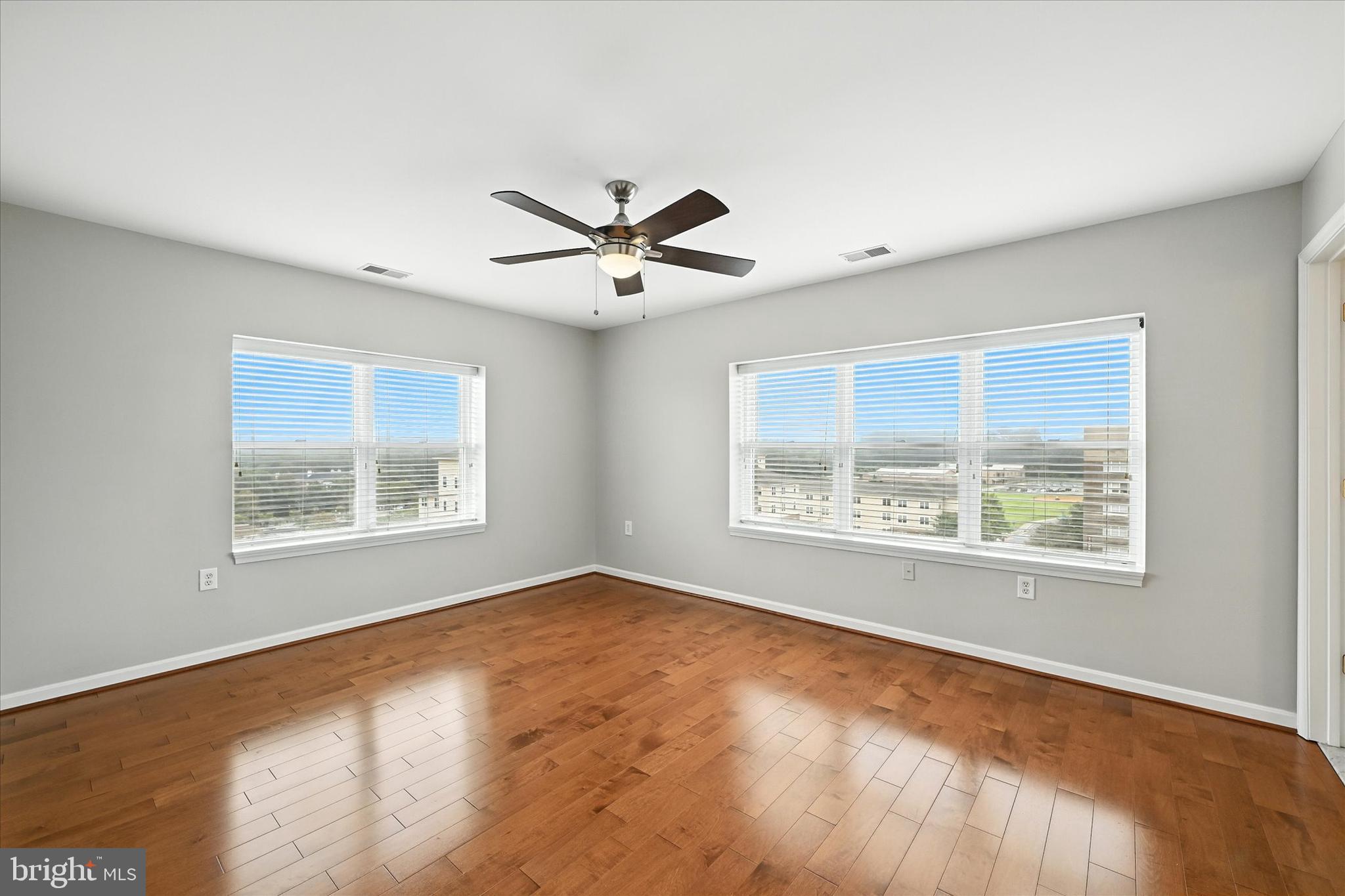 12240 Roundwood Road, Unit 808 Lutherville-Timonium, MD 21093 - Photo 22 of 31 a view of an empty room with a window
