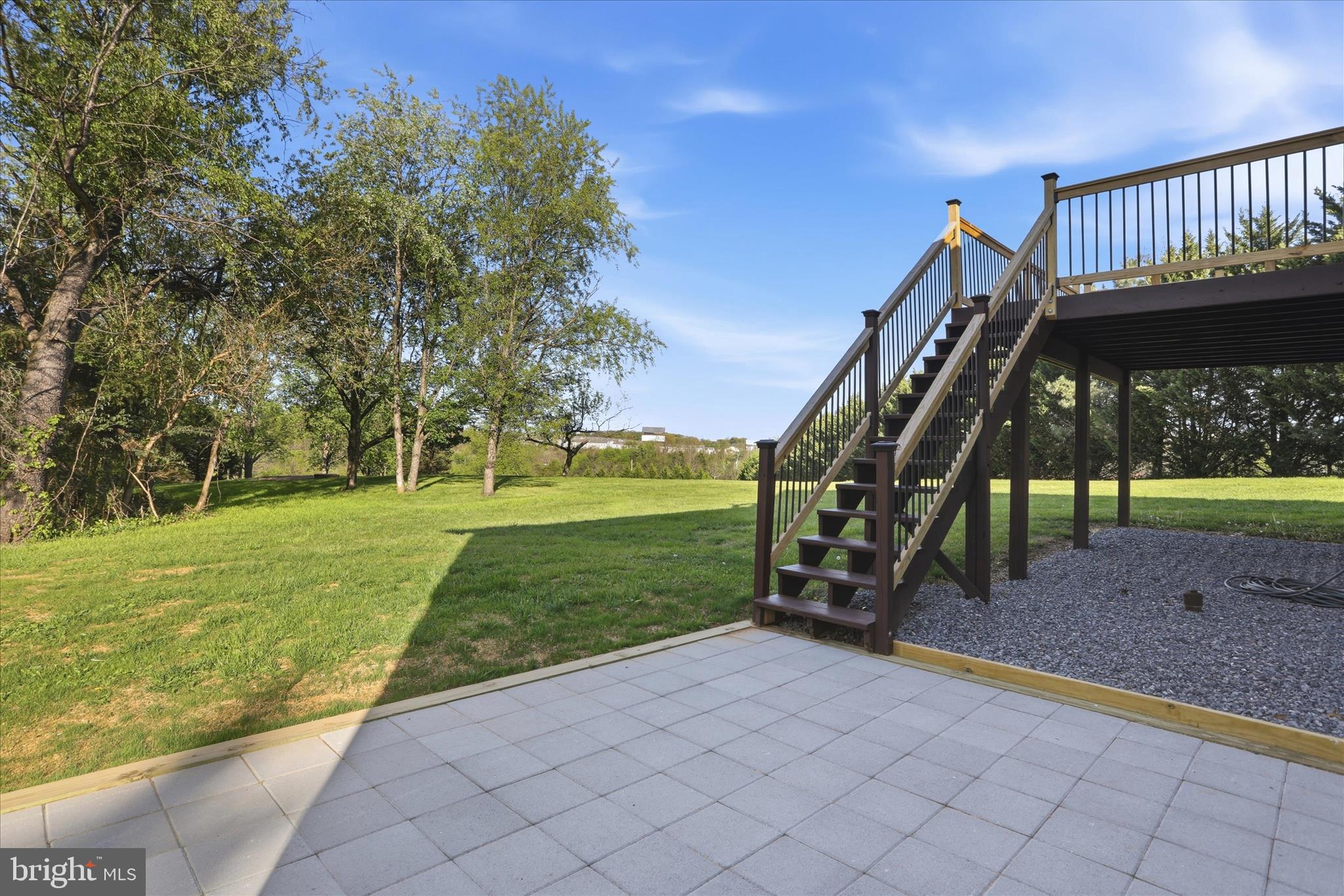 174 Open Field Lane Falling Waters, WV 25419 - Photo 44 of 56 Rear patio space that leads to back yard