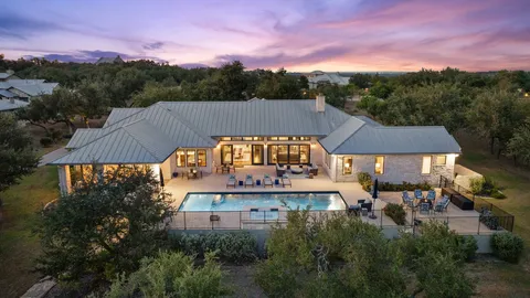 an aerial view of a house with a garden