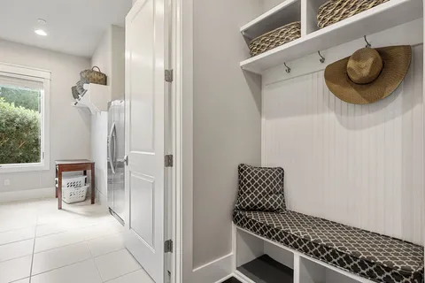 a view of a livingroom with furniture and ceiling fan