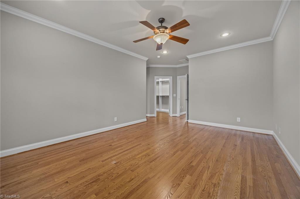 2000 Muirfield Court Elon, NC 27244 - Photo 19 of 43 Primary Bedroom (18x13 approx) w/ Walk-in Closet and updated Bath