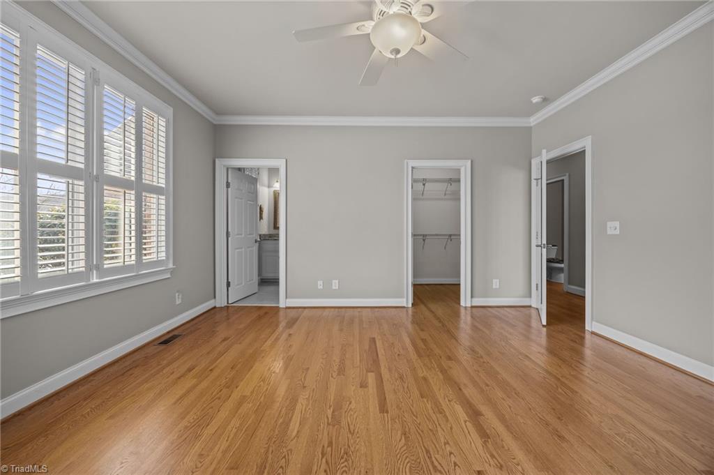 2000 Muirfield Court Elon, NC 27244 - Photo 24 of 43 Bedroom 2 (15x15) with Walk-in Closet and Bath w/ Tub/Shower combo