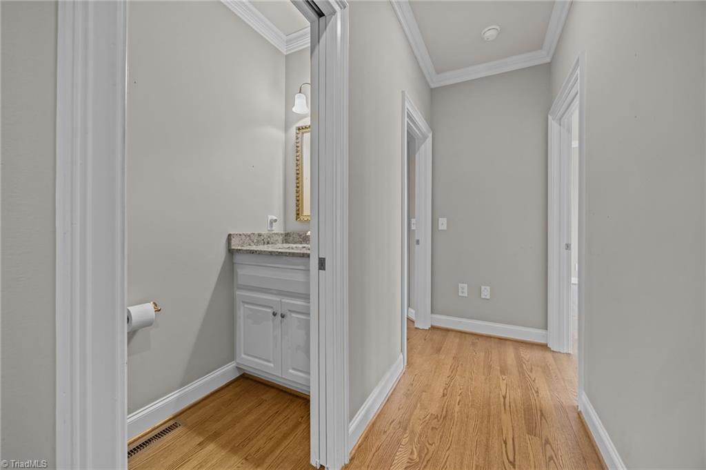 2000 Muirfield Court Elon, NC 27244 - Photo 26 of 43 Powder Room (half bath) w/ Pocket Door