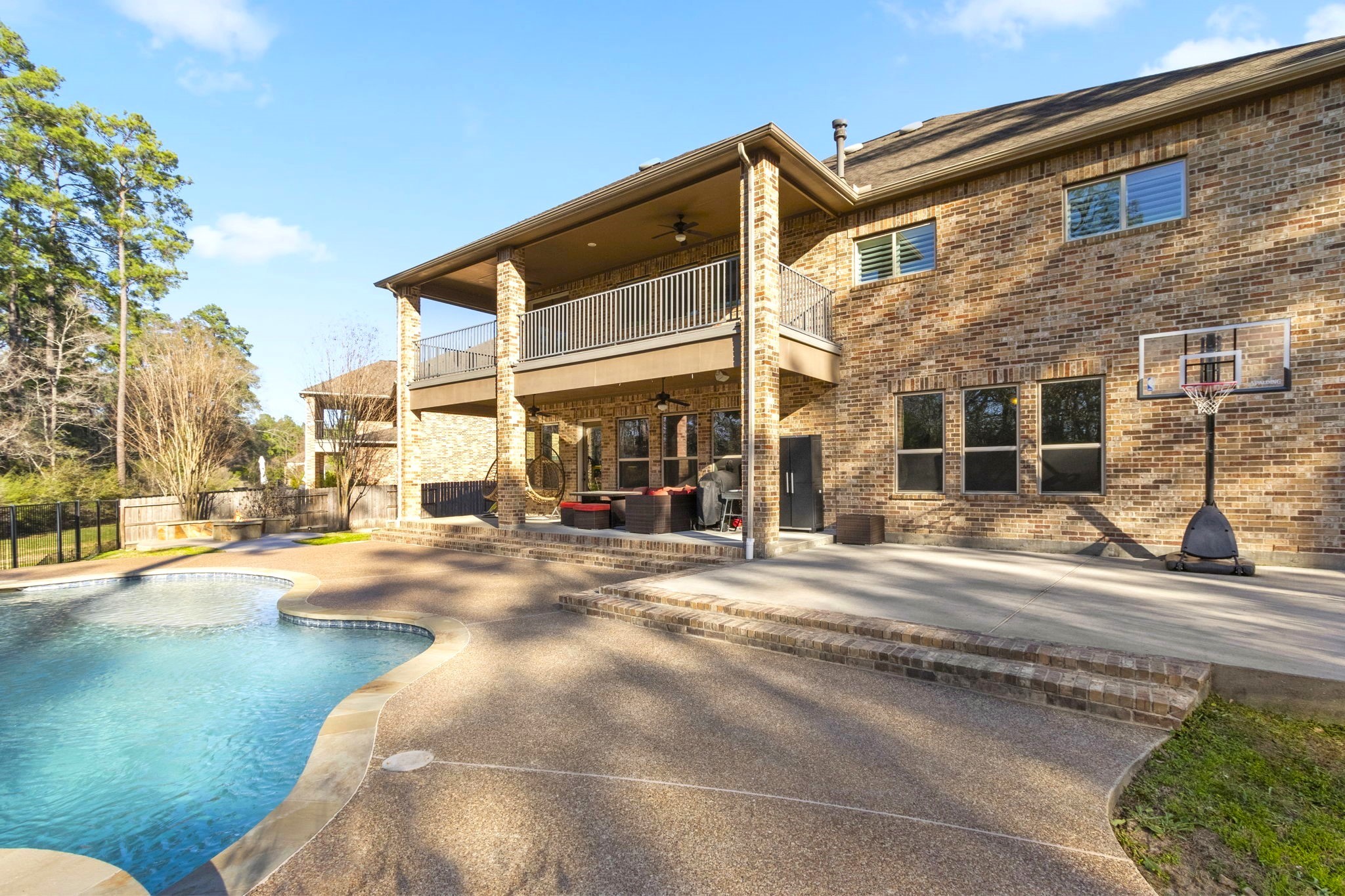23211 Belted Kingfisher Trail Spring, TX 77389 - Photo 44 of 47 Room for LOTS of guests and games in this awesome backyard set-up!