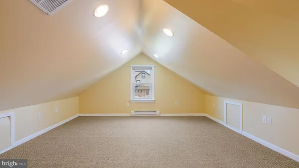 a view of a brick house with an empty space