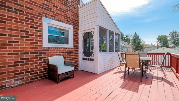 a view of a car park in front of house