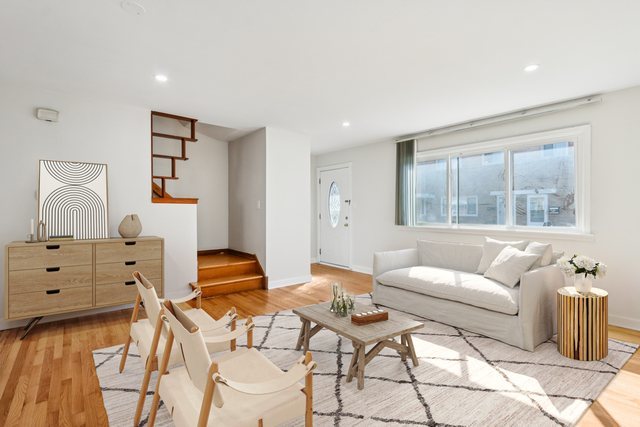 8666 Gregory Lane, Unit C Des Plaines, IL 60016 - Photo 2 of 30 a living room with furniture and two windows