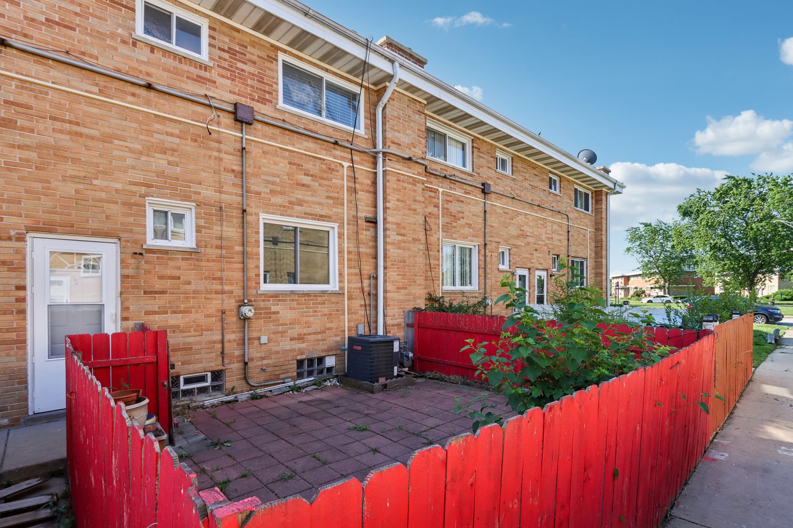 8666 Gregory Lane, Unit C Des Plaines, IL 60016 - Photo 22 of 30 a view of a house with backyard and sitting area