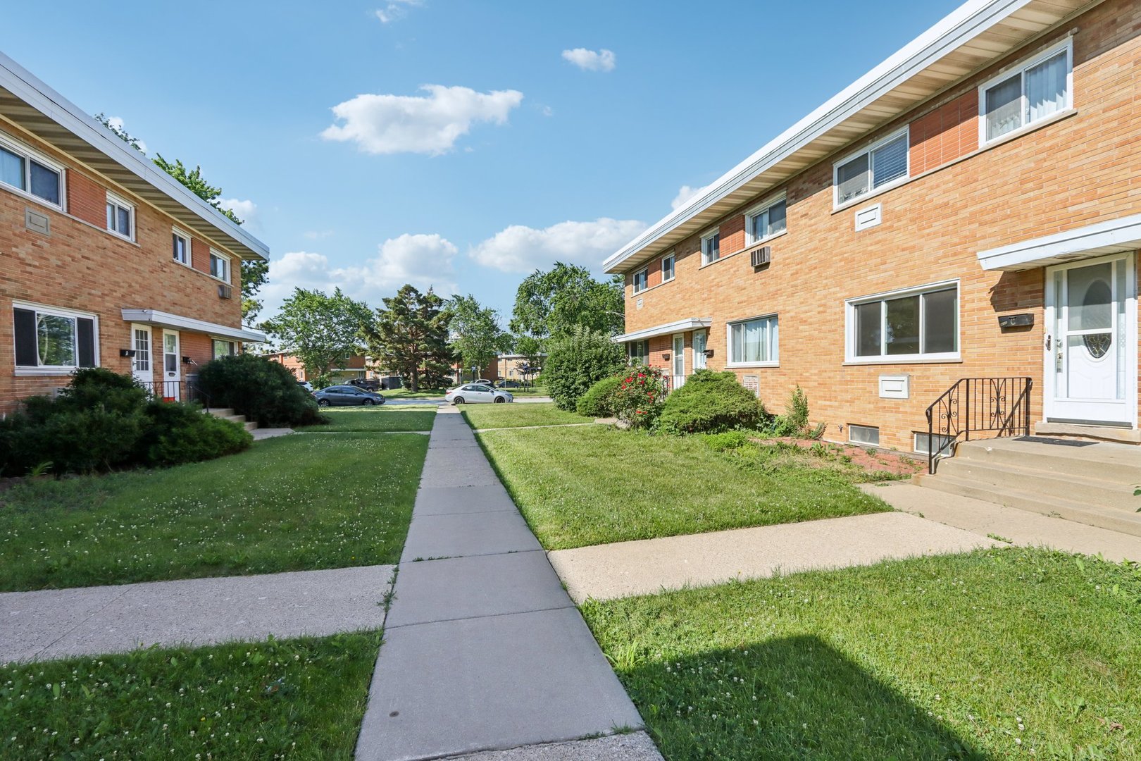 8666 Gregory Lane, Unit C Des Plaines, IL 60016 - Photo 23 of 30 a view of a house with a yard