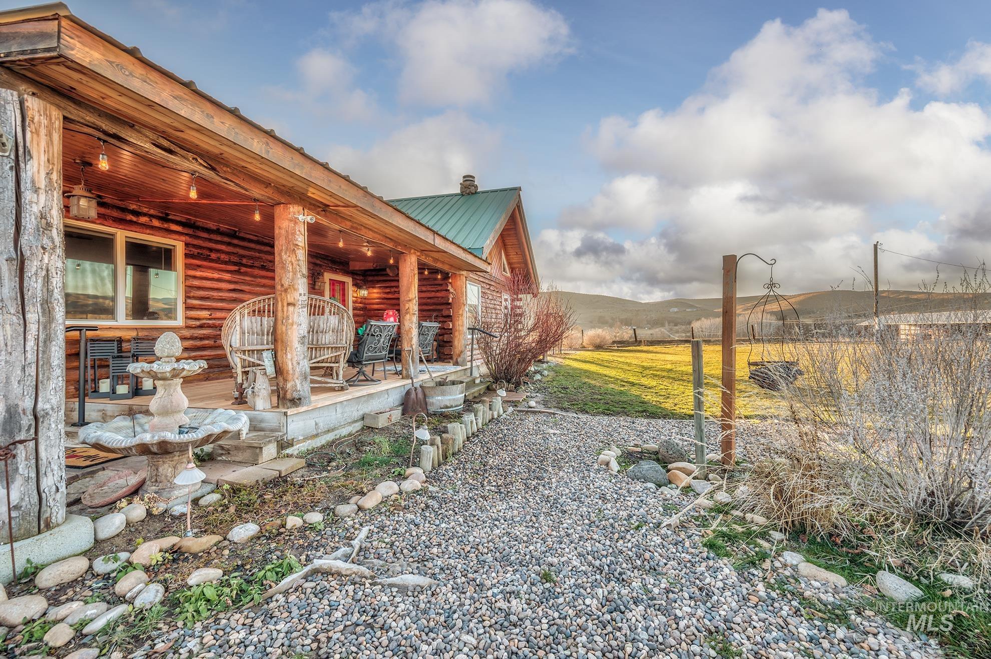 1855 Jones Road Weiser, ID 83672 - Photo 27 of 33 View of green lawn with a mountain view