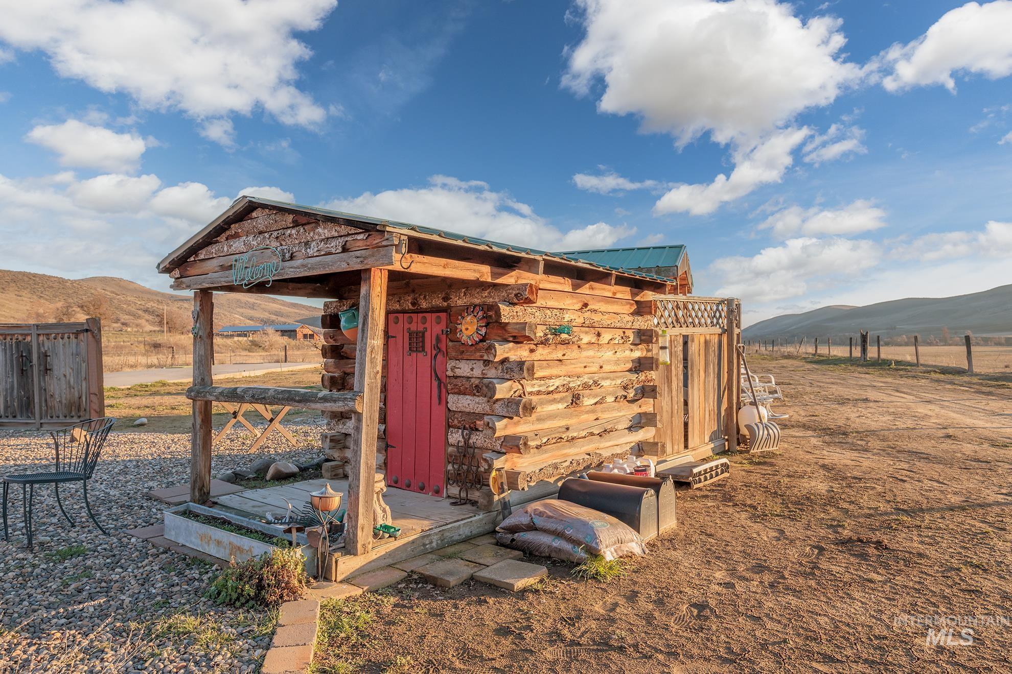 1855 Jones Road Weiser, ID 83672 - Photo 30 of 33 View of outdoor structure featuring a mountain view and a view of rural / pastoral area
