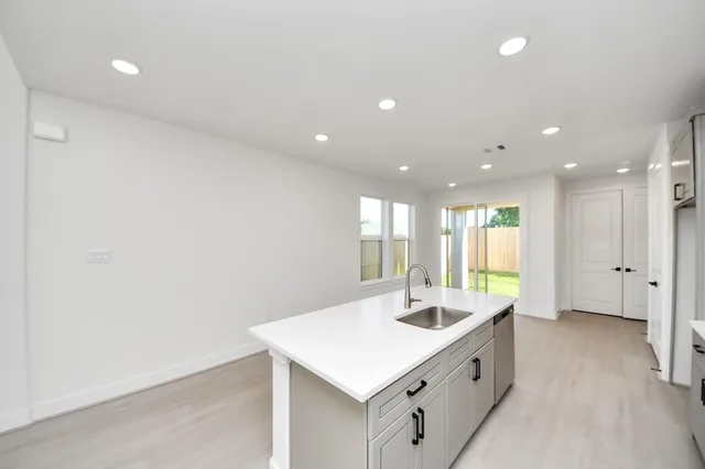 a bathroom with a sink and a bathtub