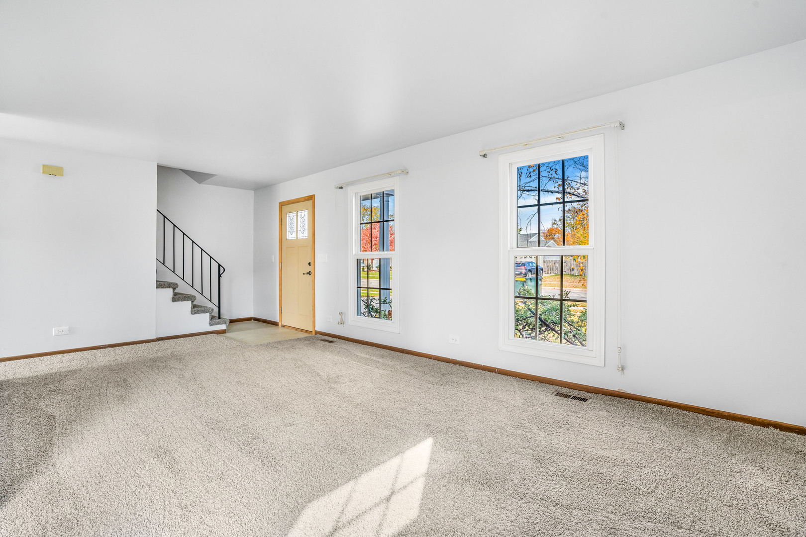1388 Bow String Court Carol Stream, IL 60188 - Photo 4 of 24 an empty room with windows