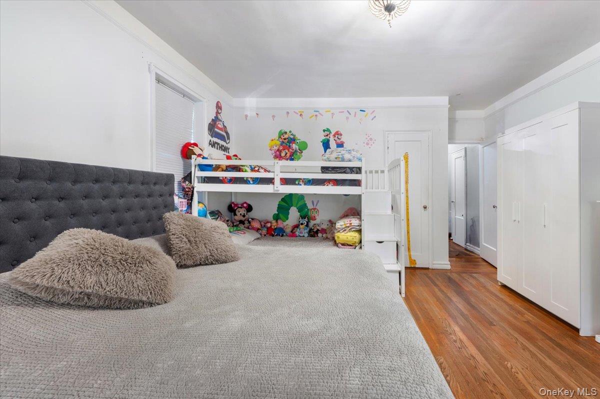 43-01 46th Street, Unit 2A Queens, NY 11104 - Photo 10 of 18 a living room with furniture and a couch