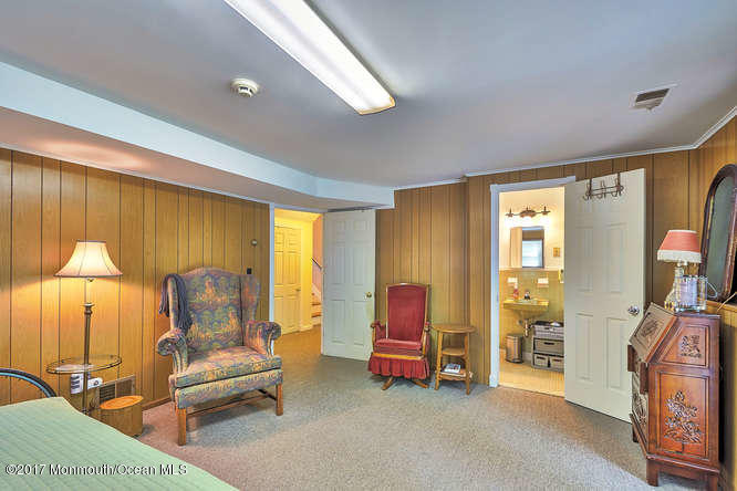 271 Jackson Pines Road Jackson, NJ 08527 - Photo 21 of 26 a living room with furniture and a flat screen tv