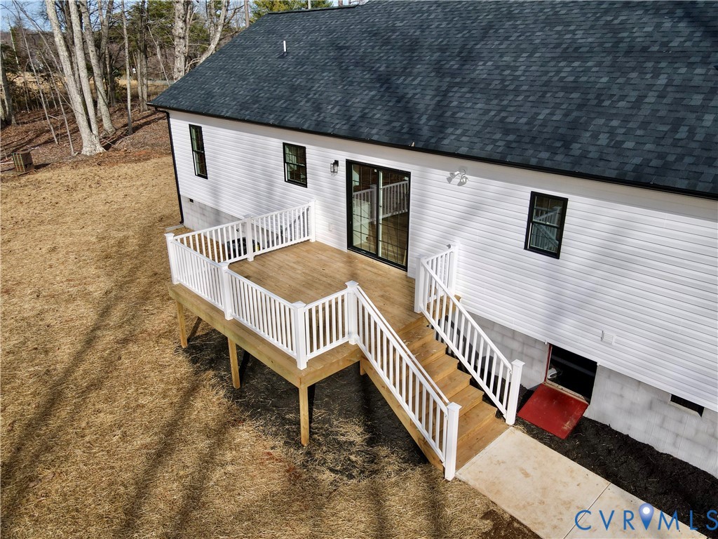 9807 Old Courthouse Road Appomattox, VA 24522 - Photo 16 of 19 Rear view of property featuring a shingled roof an