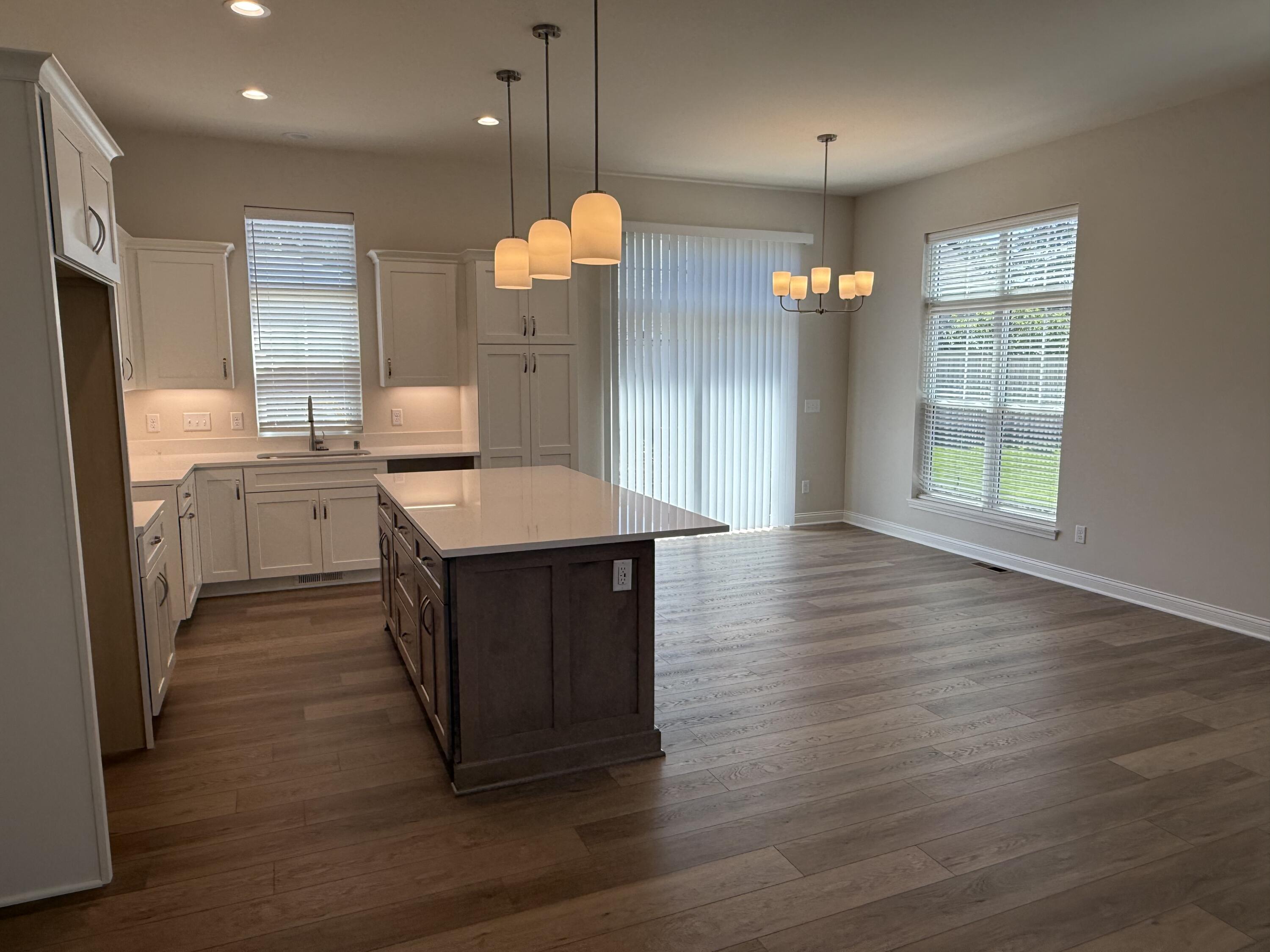 369 Evergreen Lane Pewaukee, WI 53072 - Photo 8 of 27 Kitchen, Dining and Patio Door