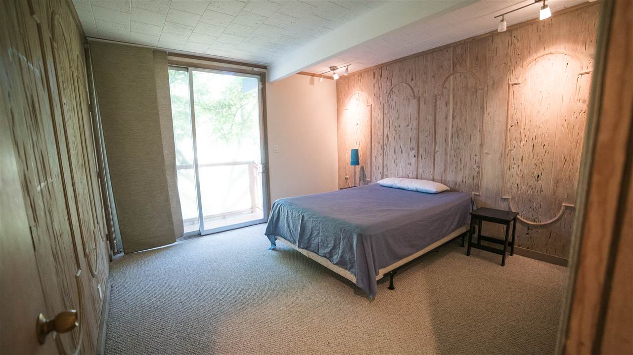 3802 Brookview Road Rockford, IL 61107 - Photo 19 of 25 a bedroom with a bed and a window