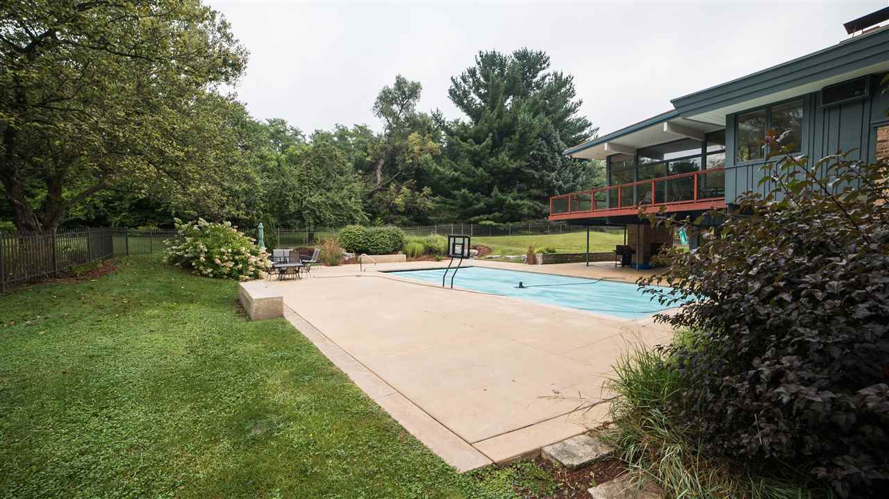 3802 Brookview Road Rockford, IL 61107 - Photo 23 of 25 a view of a house with garden and a sitting area