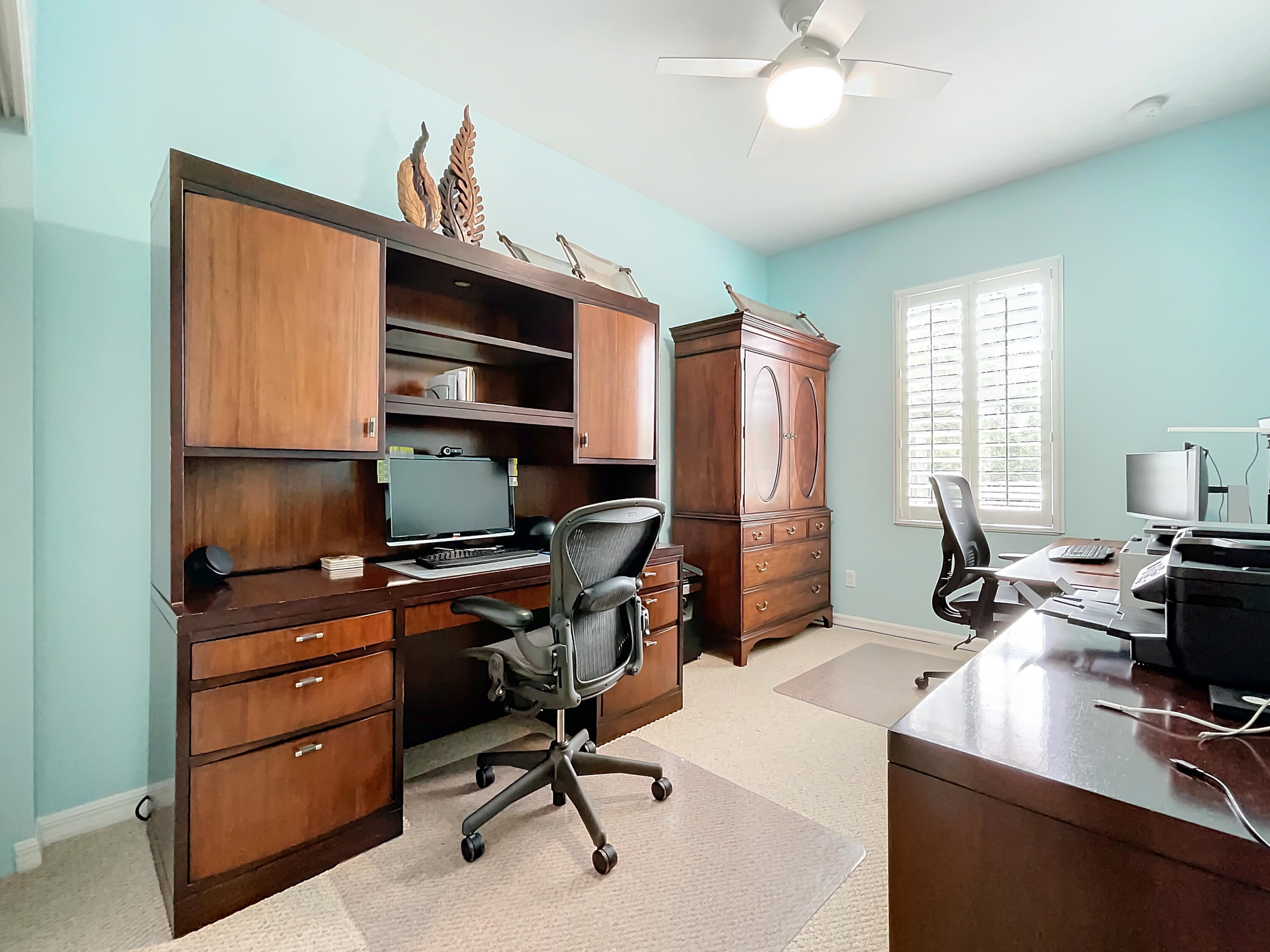 2742 Avalon Way Jupiter, FL 33458 - Photo 19 of 48 a view of a workspace with furniture and a window