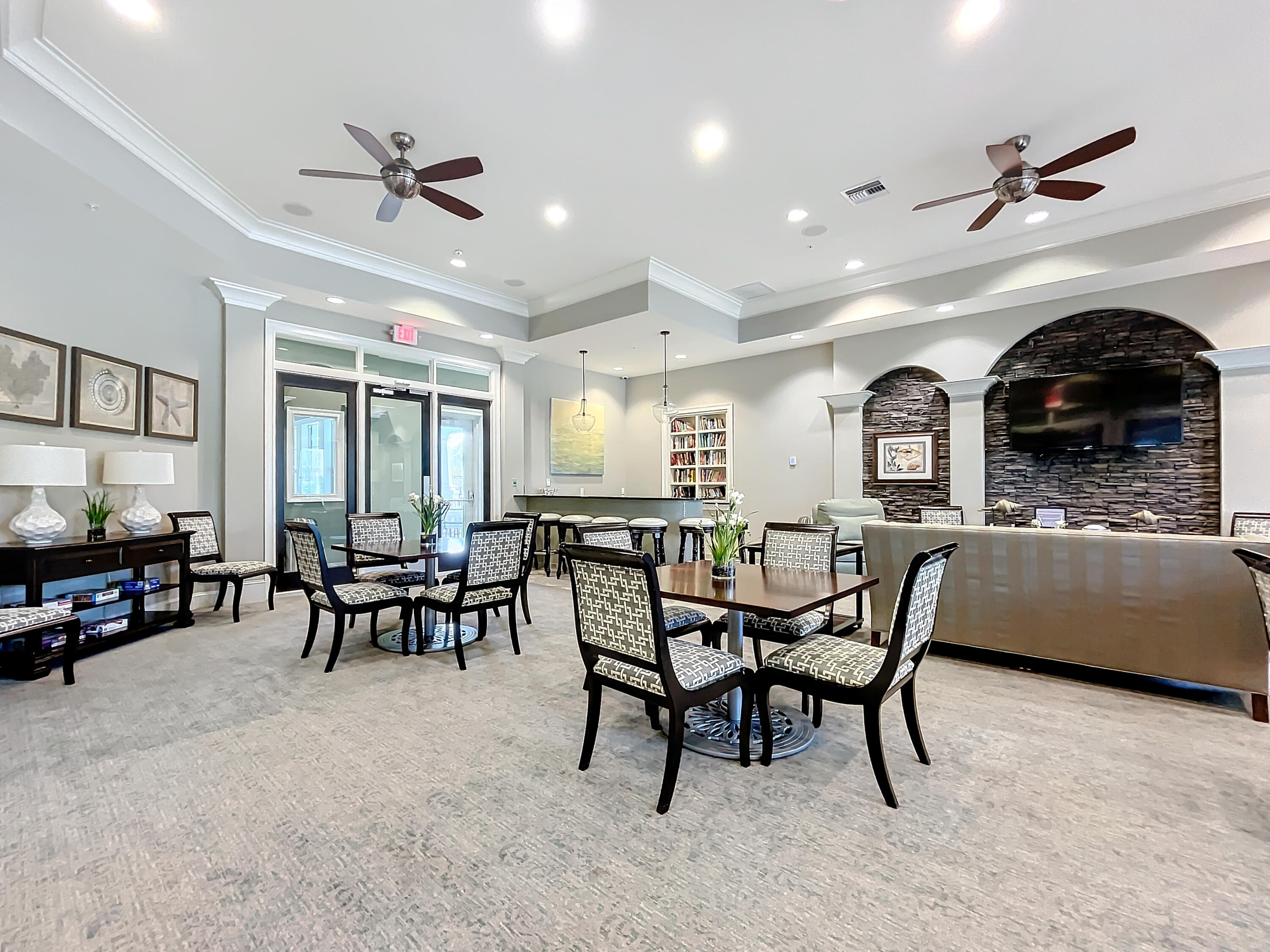 2742 Avalon Way Jupiter, FL 33458 - Photo 35 of 48 a view of a dining room with furniture and a chandelier