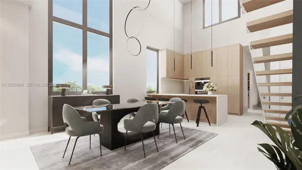 a view of a dining room with furniture window and outside view