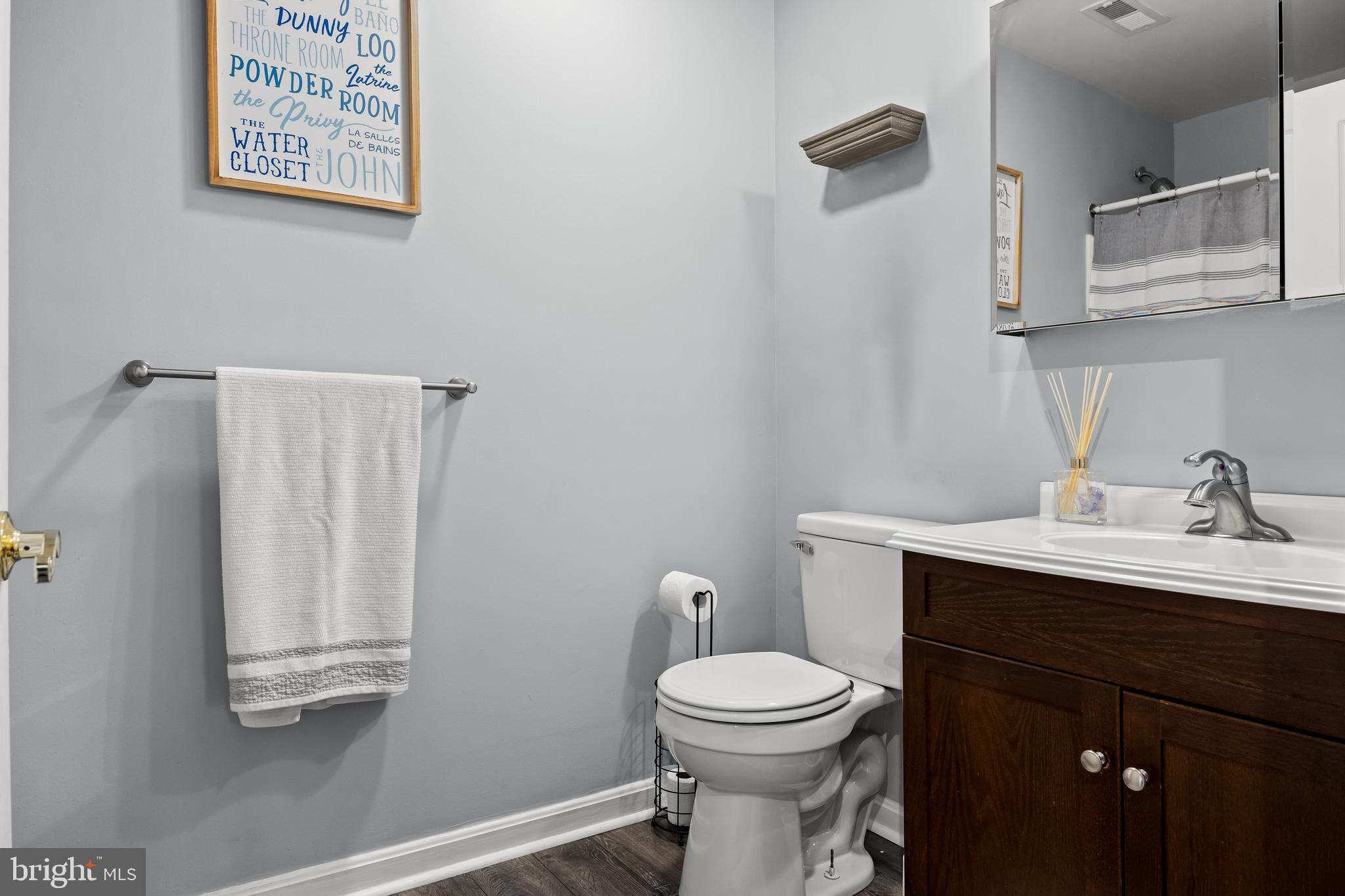 151 Wildflower Place Delran, NJ 08075 - Photo 17 of 29 a bathroom with a toilet a sink and mirror